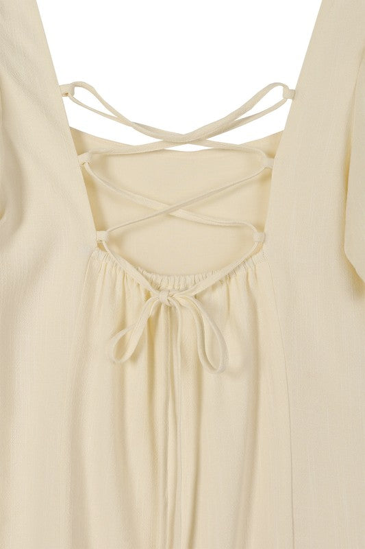 Scoop neck puff sleeve cream with back strap dress