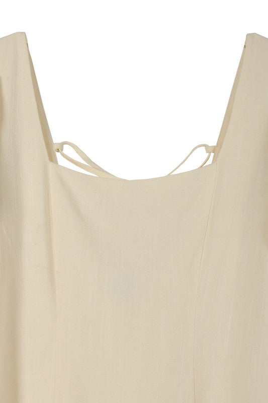 Scoop neck puff sleeve cream with back strap dress